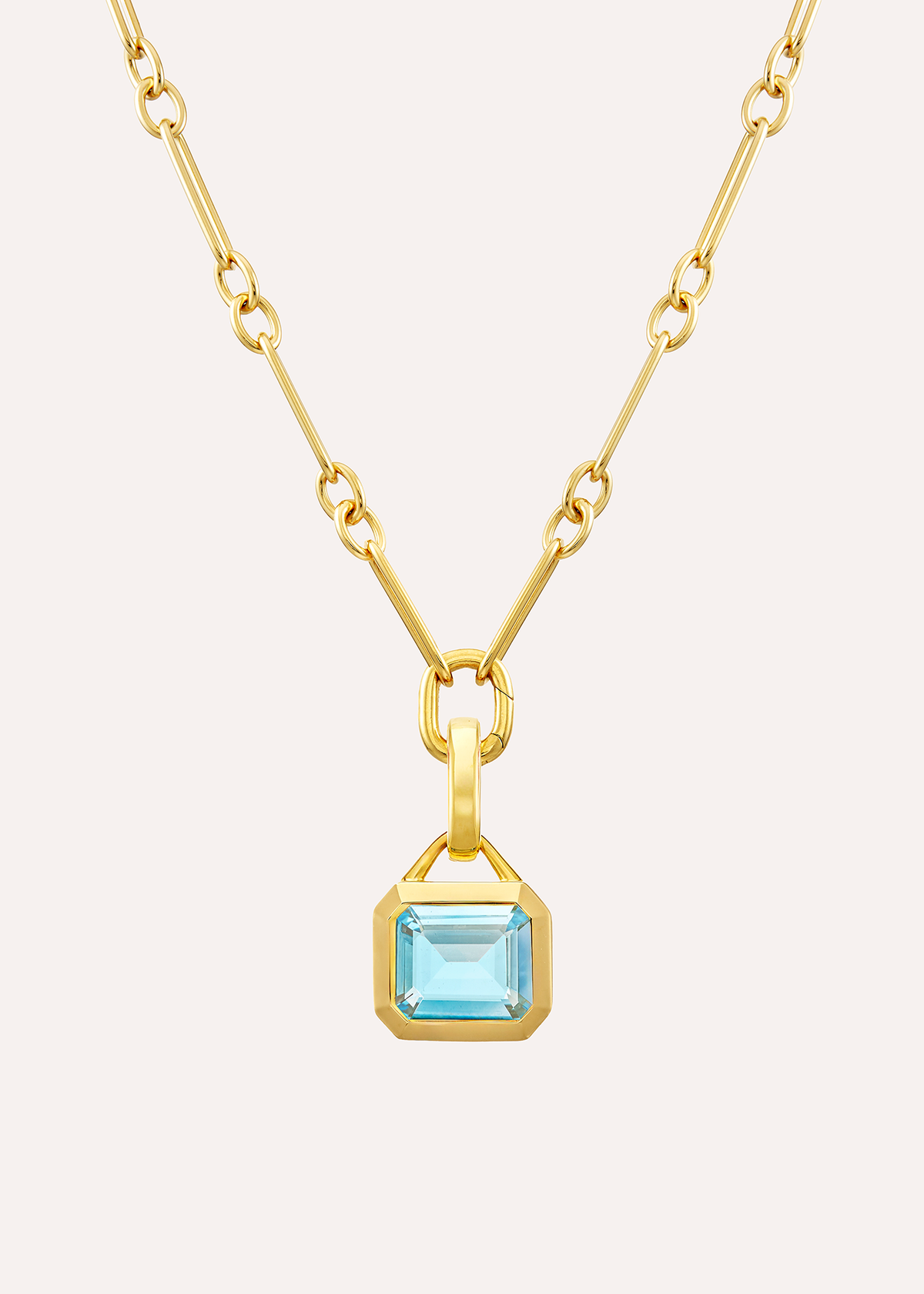 18k gold vermeil rectangular-link necklace with an octagonal pale blue topaz pendant, front view.